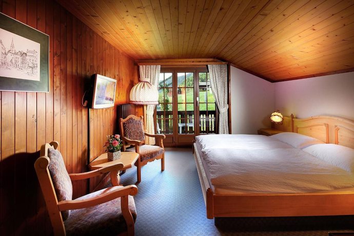 Imagen de la habitación del Hotel Hôtel Aux Mille Etoiles. Foto 12