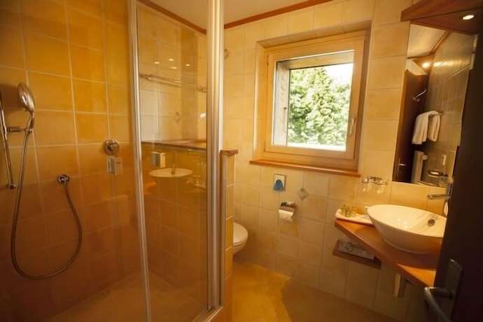 Imagen de la habitación del Hotel Hôtel Aux Mille Etoiles. Foto 14