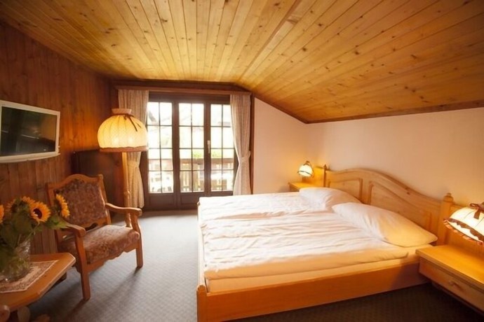 Imagen de la habitación del Hotel Hôtel Aux Mille Etoiles. Foto 15