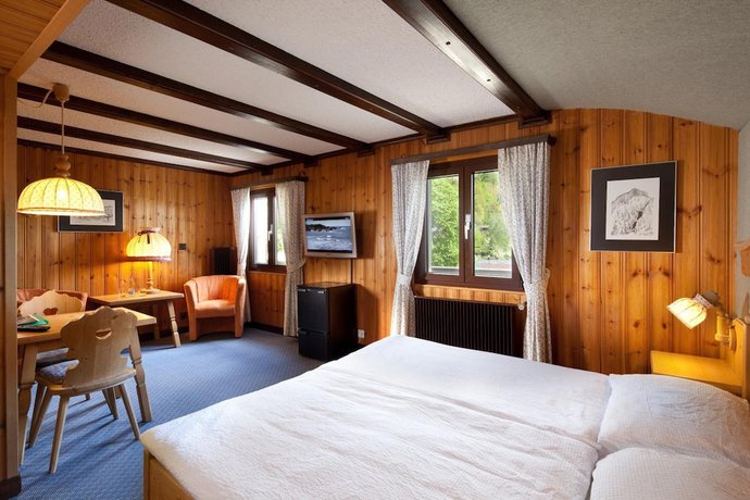 Imagen de la habitación del Hotel Hôtel Aux Mille Etoiles. Foto 16