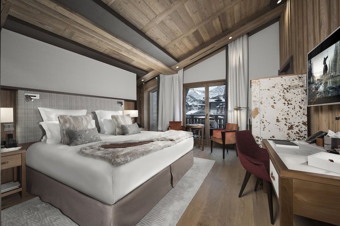 Imagen de la habitación del Hotel H&ocirc;tel Barri&egrave;re Les Neiges Courchevel. Foto 3