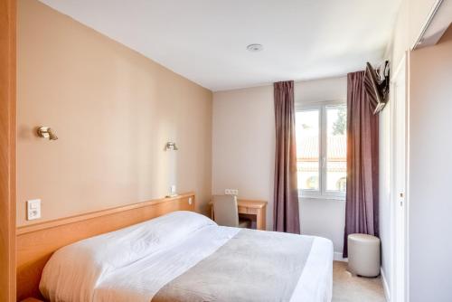 Imagen de la habitación del Hotel H&ocirc;tel Beau Rivage, LE LAVANDOU. Foto 5