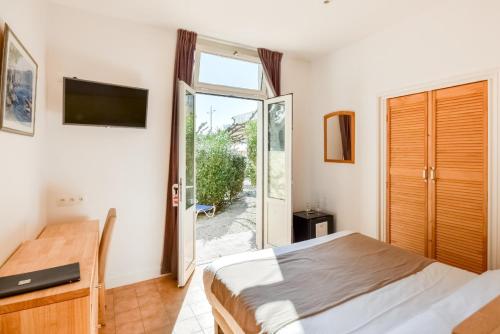 Imagen de la habitación del Hotel H&ocirc;tel Beau Rivage, LE LAVANDOU. Foto 6