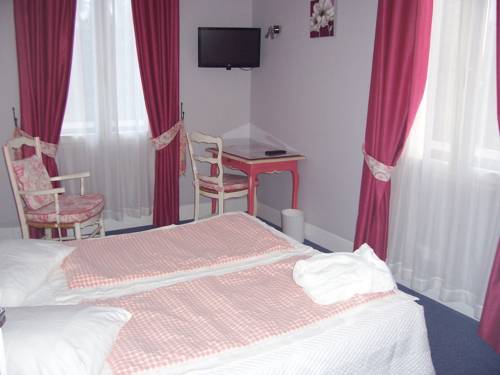 Imagen de la habitación del Hotel H&ocirc;tel Beausejour. Foto 8