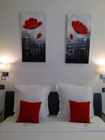 Imagen de la habitación del Hotel H&ocirc;tel Beausoleil. Foto 3