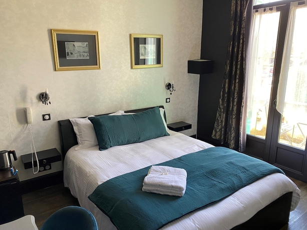 Imagen de la habitación del Hotel H&ocirc;tel Beausoleil. Foto 4