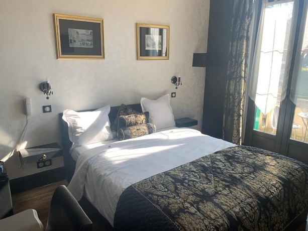 Imagen de la habitación del Hotel H&ocirc;tel Beausoleil. Foto 5