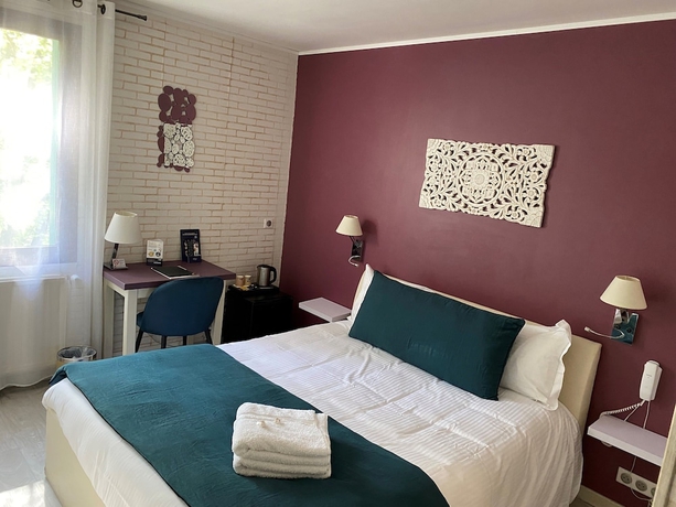 Imagen de la habitación del Hotel H&ocirc;tel Beausoleil. Foto 8