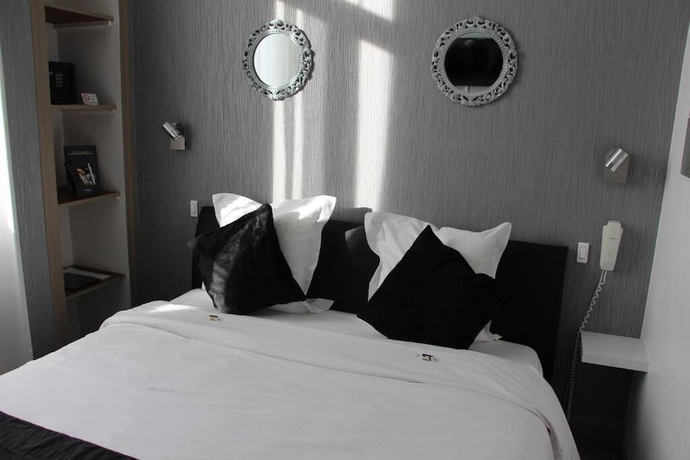 Imagen de la habitación del Hotel H&ocirc;tel Beausoleil. Foto 11