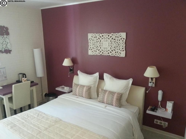 Imagen de la habitación del Hotel H&ocirc;tel Beausoleil. Foto 13