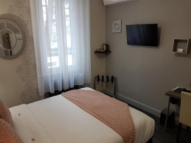 Imagen de la habitación del Hotel H&ocirc;tel Beausoleil. Foto 16