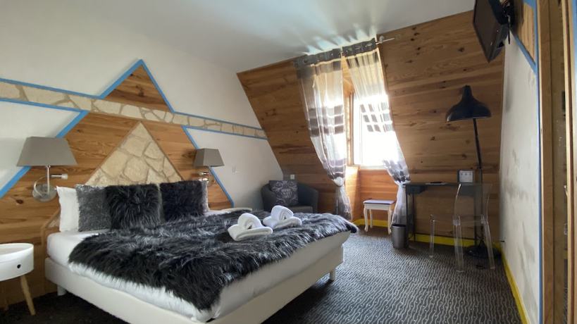Imagen de la habitación del Hotel H&ocirc;tel Bien-Etre Aux Cypr&egrave;s de Marquay. Foto 2