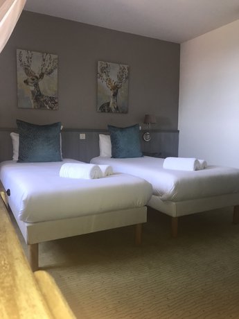 Imagen de la habitación del Hotel H&ocirc;tel Bien-Etre Aux Cypr&egrave;s de Marquay. Foto 9
