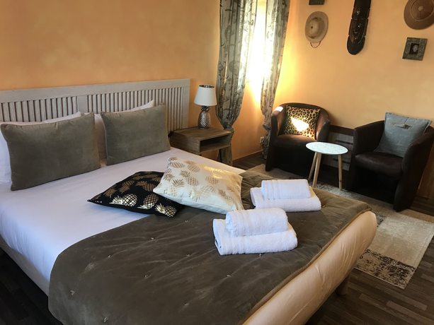 Imagen de la habitación del Hotel H&ocirc;tel Bien-Etre Aux Cypr&egrave;s de Marquay. Foto 17