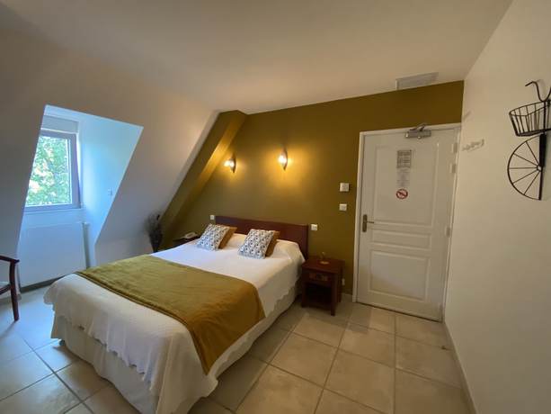 Imagen de la habitación del Hotel Hôtel Bon Encontre, Sarlat-la-Canéda. Foto 12