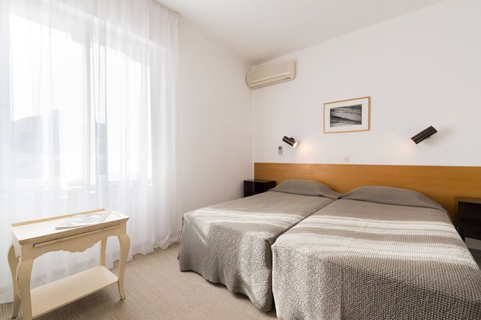 Imagen de la habitación del Hotel H&ocirc;tel Cala di l\'Oru. Foto 12