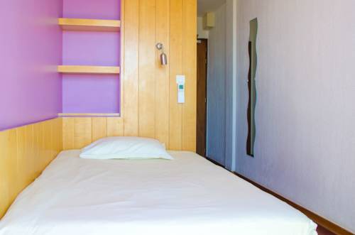 Imagen de la habitación del Hotel H&ocirc;tel California, LE LAVANDOU. Foto 11