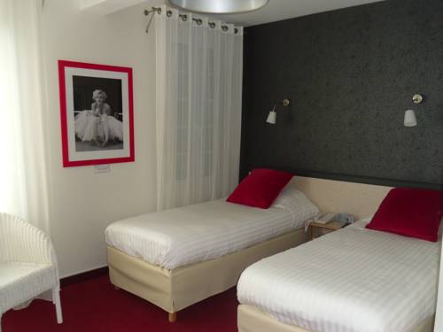 Imagen de la habitación del Hotel H&ocirc;tel Calme Des Pins Spa. Foto 3