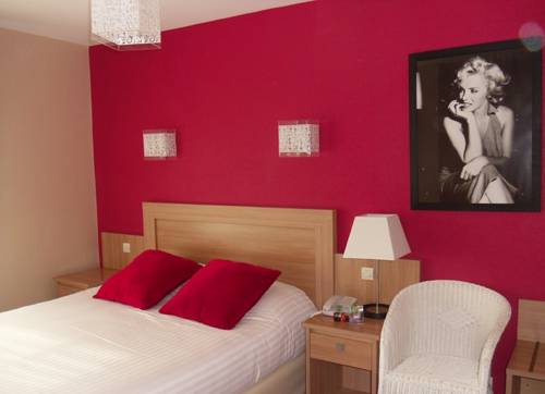Imagen de la habitación del Hotel H&ocirc;tel Calme Des Pins Spa. Foto 6