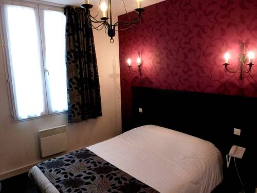 Imagen de la habitación del Hotel H&ocirc;tel Calme Des Pins Spa. Foto 13