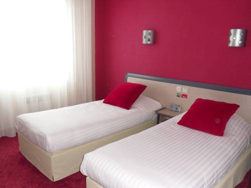 Imagen de la habitación del Hotel H&ocirc;tel Calme Des Pins Spa. Foto 15