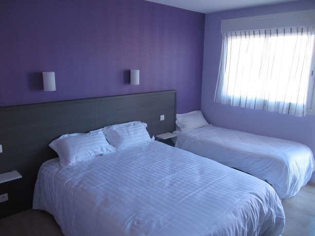 Imagen de la habitación del Hotel H&ocirc;tel Cantal Cottages. Foto 10