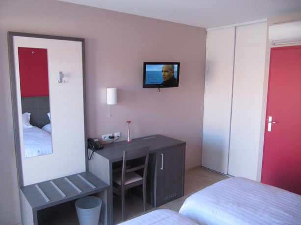 Imagen de la habitación del Hotel H&ocirc;tel Cantal Cottages. Foto 14