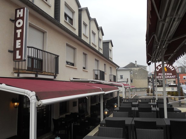 Imagen del bar/restaurante del Hotel Hôtel Carpini. Foto 11