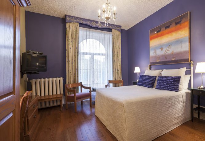 Imagen de la habitación del Hotel H&ocirc;tel Ch&acirc;teau de l\'Argoat. Foto 10