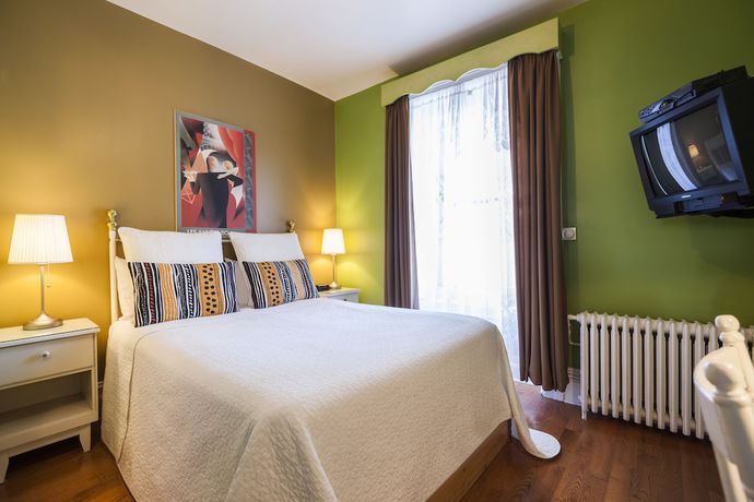 Imagen de la habitación del Hotel H&ocirc;tel Ch&acirc;teau de l\'Argoat. Foto 17