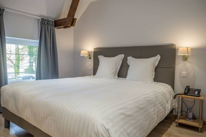 Imagen de la habitación del Hotel H&ocirc;tel Ch&acirc;teau de la Marli&egrave;re. Foto 10