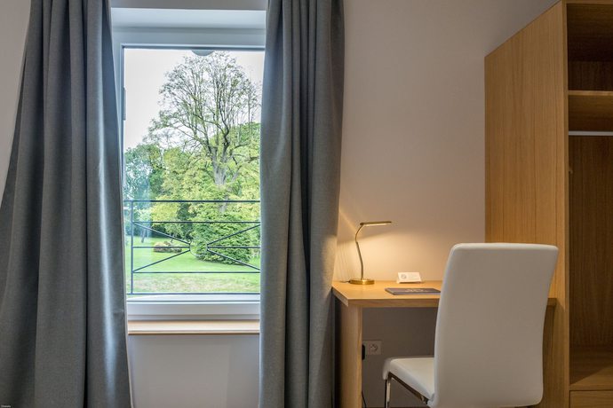 Imagen de la habitación del Hotel H&ocirc;tel Ch&acirc;teau de la Marli&egrave;re. Foto 17