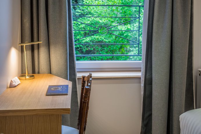 Imagen de la habitación del Hotel H&ocirc;tel Ch&acirc;teau de la Marli&egrave;re. Foto 19