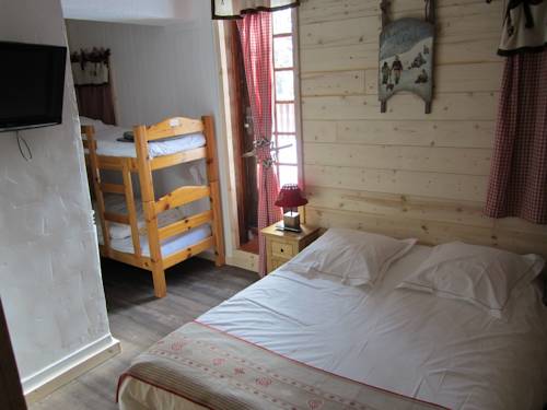 Imagen de la habitación del Hotel H&ocirc;tel Chalet Le Caribou. Foto 4