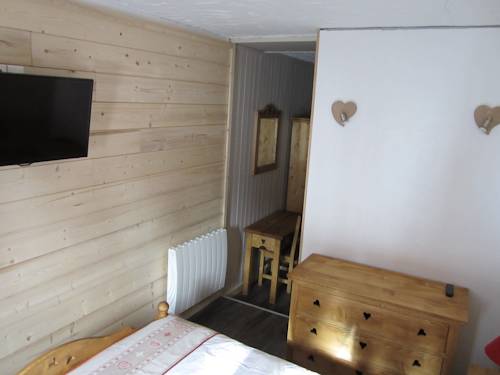 Imagen de la habitación del Hotel H&ocirc;tel Chalet Le Caribou. Foto 16