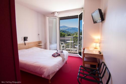 Imagen de la habitación del Hotel H&ocirc;tel Chez Pierre d\'Agos. Foto 6