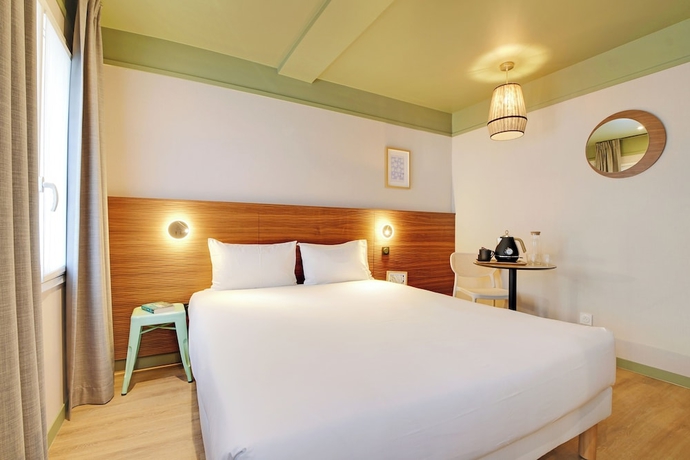 Imagen de la habitación del Hotel H&ocirc;tel Cocoon. Foto 11