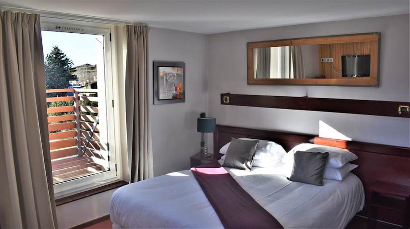 Imagen de la habitación del Hotel Hôtel Corrieu. Foto 8