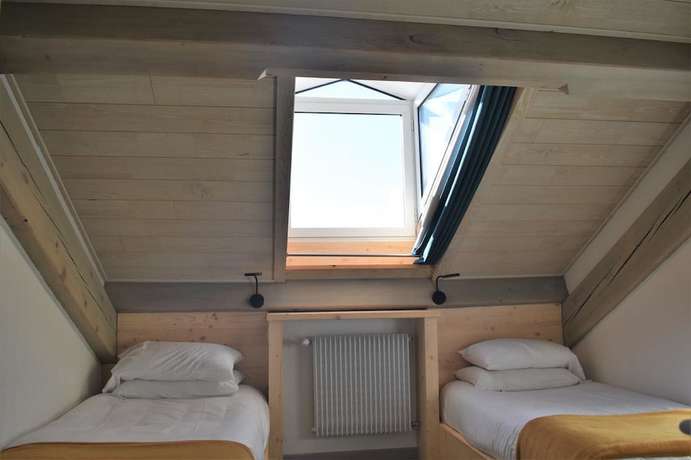 Imagen de la habitación del Hotel Hôtel Corrieu. Foto 18