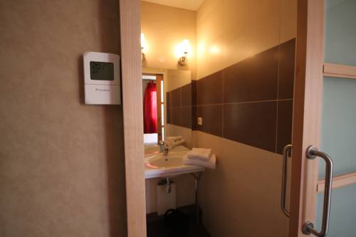 Imagen de la habitación del Hotel H&ocirc;tel D'arcins. Foto 5