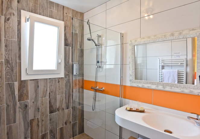 Imagen de la habitación del Hotel Hôtel De France, Mimizan. Foto 11