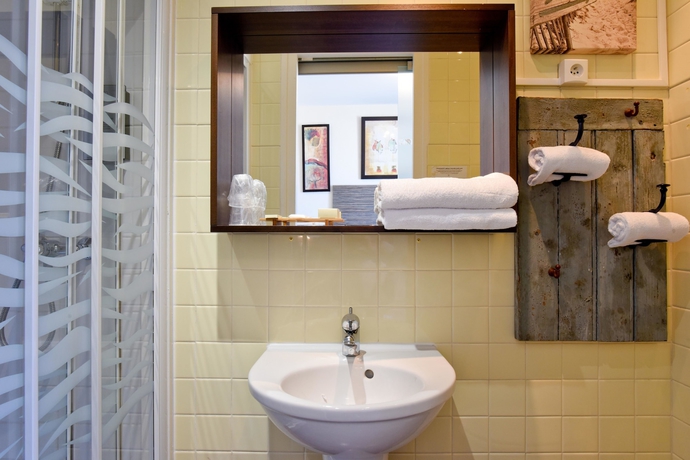 Imagen de la habitación del Hotel Hôtel De France, Mimizan. Foto 17