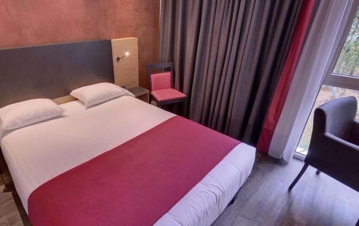 Imagen de la habitación del Hotel H&ocirc;tel De La Lou&eacute;e. Foto 2
