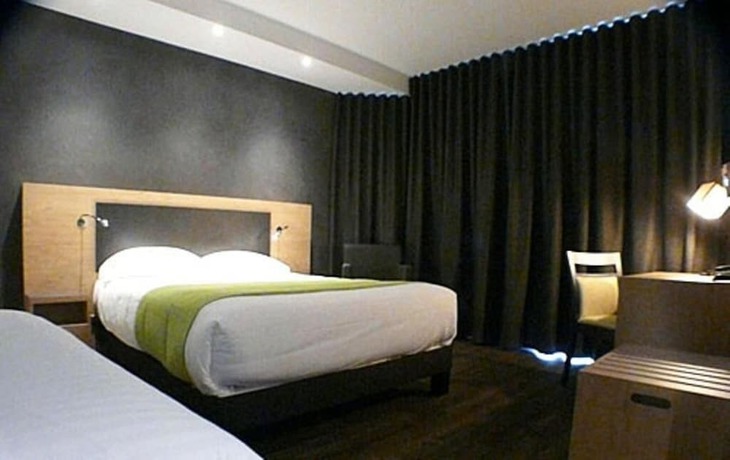 Imagen de la habitación del Hotel H&ocirc;tel De La Lou&eacute;e. Foto 5