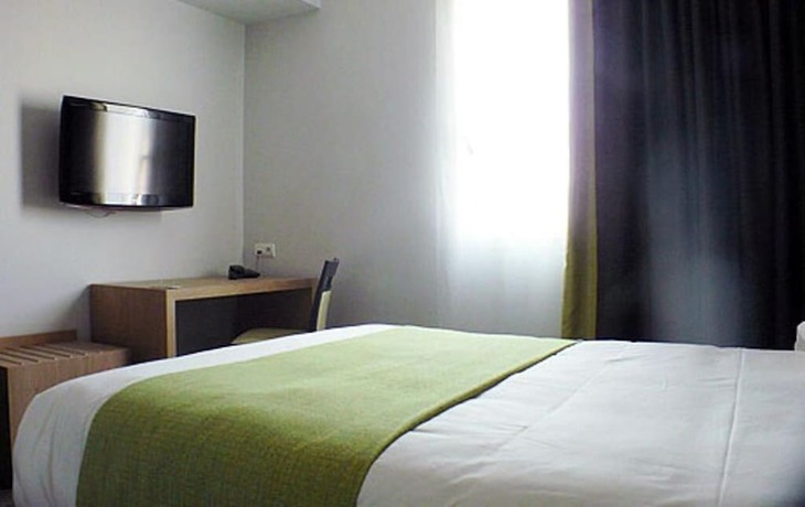 Imagen de la habitación del Hotel H&ocirc;tel De La Lou&eacute;e. Foto 8