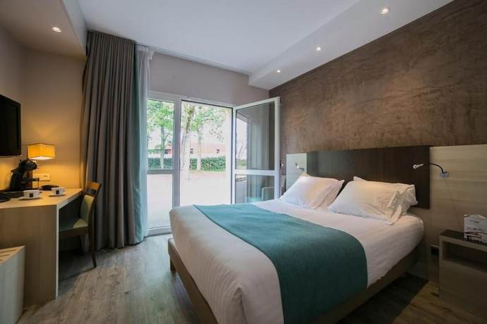 Imagen de la habitación del Hotel H&ocirc;tel De La Lou&eacute;e. Foto 10