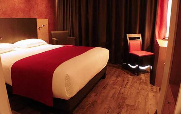 Imagen de la habitación del Hotel H&ocirc;tel De La Lou&eacute;e. Foto 14