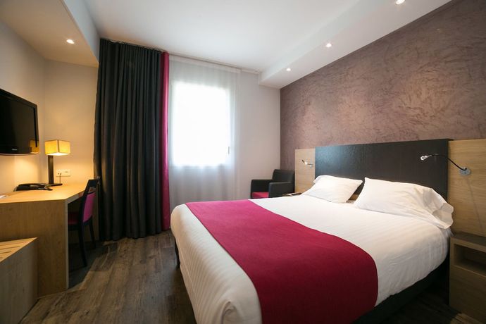 Imagen de la habitación del Hotel H&ocirc;tel De La Lou&eacute;e. Foto 15