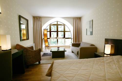 Imagen de la habitación del Hotel H&ocirc;tel De La Muse Et Du Rozier. Foto 10