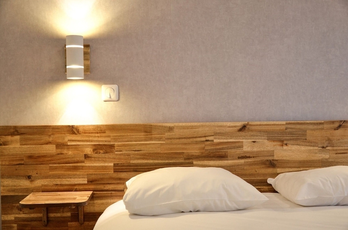 Imagen de la habitación del Hotel Hôtel De La Perdrix Rouge. Foto 5